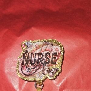 Gold and Pink Nurse Badge Reel